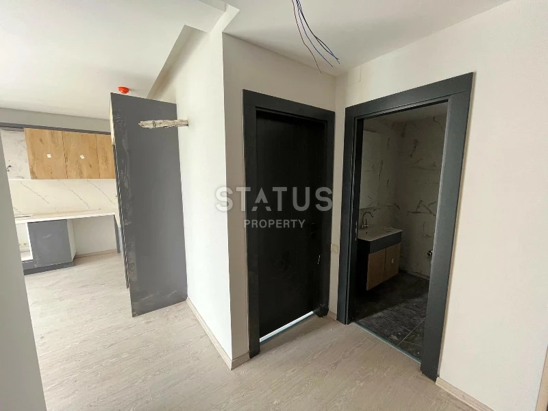 Квартира 1+1 в новом комплексе в районе Томюк, Арпачбахшиш #11