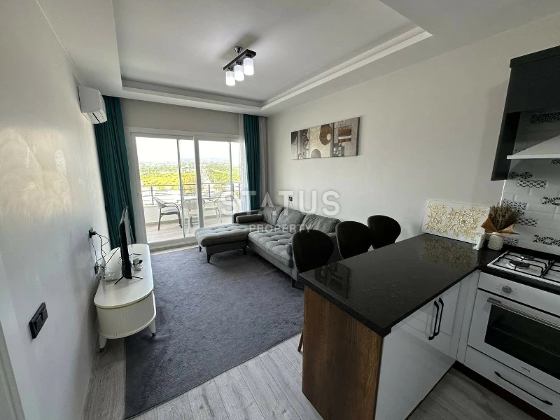 Квартира 1+1 с мебелью в районе Томюк, 75 м2